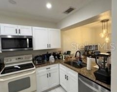 6122 Curry Ford Road - Photo Thumbnail 4