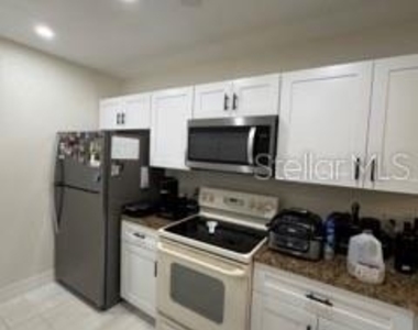 6122 Curry Ford Road - Photo Thumbnail 3