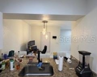 6122 Curry Ford Road - Photo Thumbnail 5