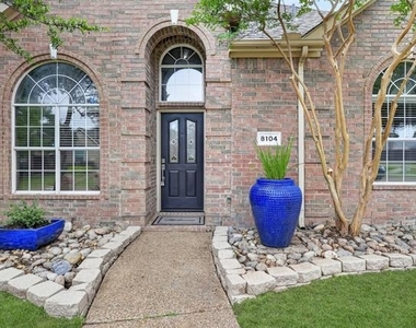 8104 Springmoss Drive - Photo Thumbnail 1