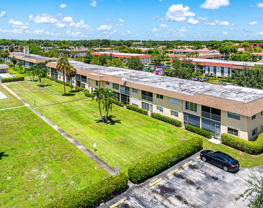 9855 Sandalfoot Boulevard - Photo Thumbnail 11