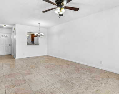 9855 Sandalfoot Boulevard - Photo Thumbnail 4