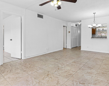 9855 Sandalfoot Boulevard - Photo Thumbnail 5