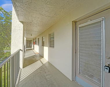 9470 Poinciana Place - Photo Thumbnail 3