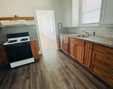 100 N Brazos St - Photo Thumbnail 2