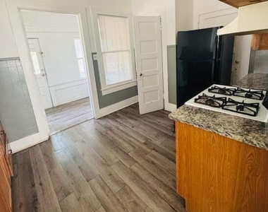 100 N Brazos St - Photo Thumbnail 3