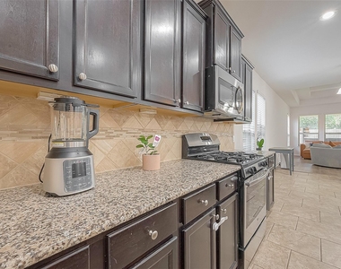 8722 Adrienne Drive - Photo Thumbnail 12