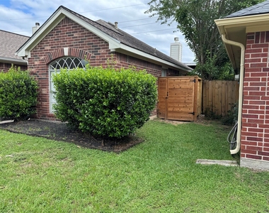 21111 Woodland Green Drive - Photo Thumbnail 1