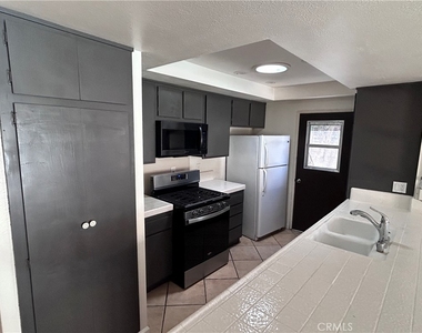 1271 N Emogene Street - Photo Thumbnail 3