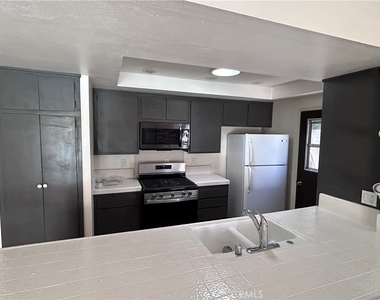 1271 N Emogene Street - Photo Thumbnail 4