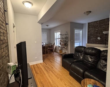 941 E 54th Place - Photo Thumbnail 1