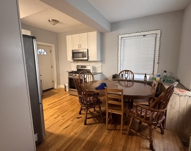 941 E 54th Place - Photo Thumbnail 2