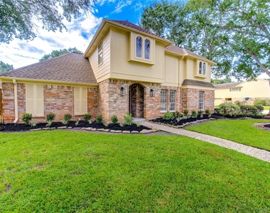 9115 Taidswood Drive - Photo Thumbnail 1