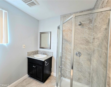 715 W 58th - Photo Thumbnail 2