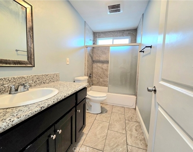 715 W 58th - Photo Thumbnail 6