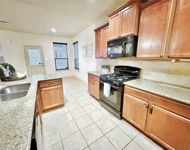 12801 Winter Springs Drive - Photo Thumbnail 3