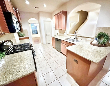 12801 Winter Springs Drive - Photo Thumbnail 4