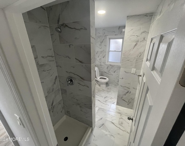 1257 Washington Avenue - Photo Thumbnail 5