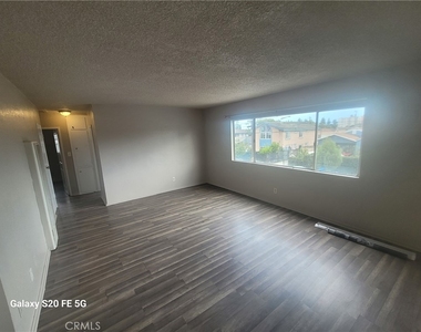 1037 W 108 Street - Photo Thumbnail 1