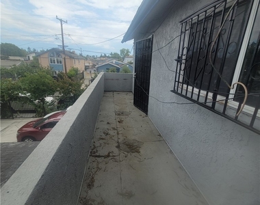 1037 W 108 Street - Photo Thumbnail 6