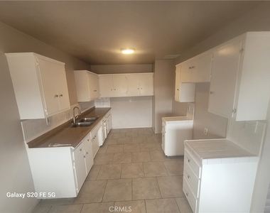 1037 W 108 Street - Photo Thumbnail 2