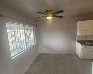 1037 W 108 Street - Photo Thumbnail 3