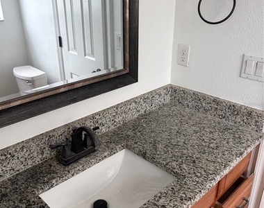 2717 N Poinciana Boulevard - Photo Thumbnail 6