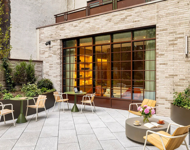 East 50 Street - Photo Thumbnail 8