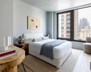 East 50 Street - Photo Thumbnail 1