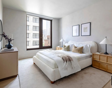 East 50 Street - Photo Thumbnail 2