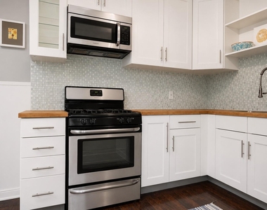 907 E 56th St - Photo Thumbnail 8