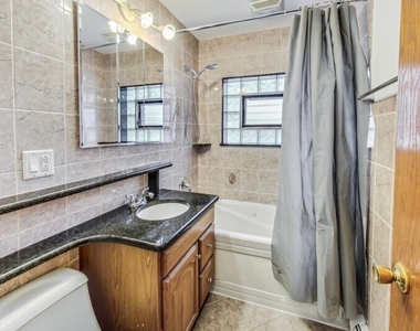 4933 N Lester Avenue - Photo Thumbnail 2