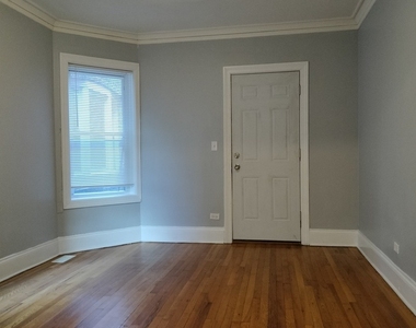 7408 S Eberhart Avenue - Photo Thumbnail 2
