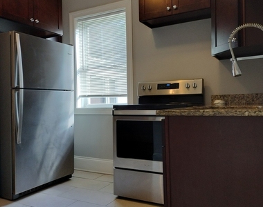 7408 S Eberhart Avenue - Photo Thumbnail 6