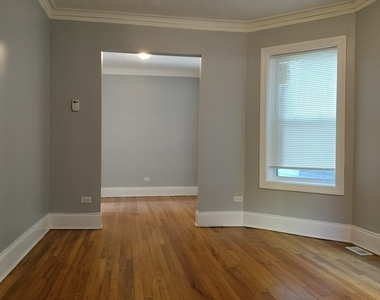7408 S Eberhart Avenue - Photo Thumbnail 1