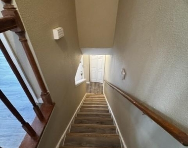 8310 Wild Rose Street - Photo Thumbnail 11