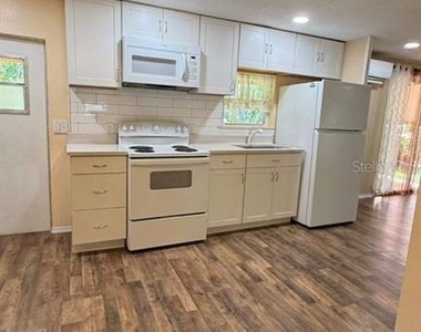 1703 Blanche Ave - Photo Thumbnail 3