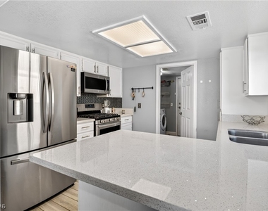 7520 Bowles Drive - Photo Thumbnail 4