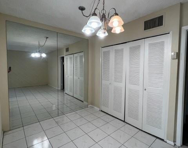 1407 Ne 56th Street - Photo Thumbnail 1