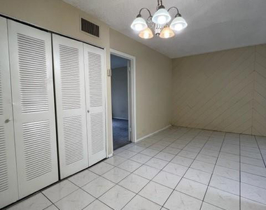 1407 Ne 56th Street - Photo Thumbnail 2