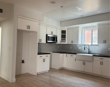 1122 E 94th Street - Photo Thumbnail 3