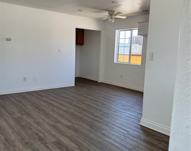 2710 W 54th - Photo Thumbnail 2