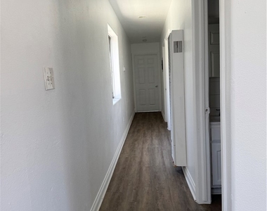 2710 W 54th - Photo Thumbnail 8