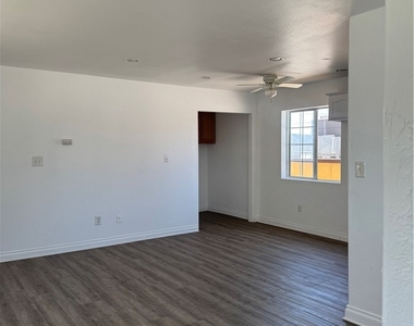 2710 W 54th - Photo Thumbnail 3