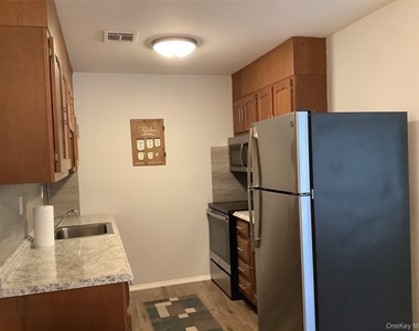 201 Newcastle Court - Photo Thumbnail 2