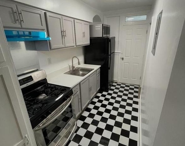 1311 Fort Stevens Drive Nw - Photo Thumbnail 3
