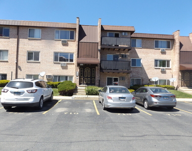 710 W Huntington Commons Road - Photo Thumbnail 1