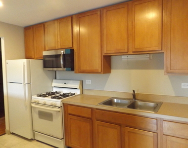 710 W Huntington Commons Road - Photo Thumbnail 9