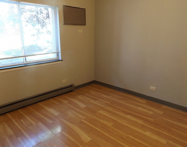 710 W Huntington Commons Road - Photo Thumbnail 5