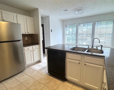 9826 Chiselhurst Drive - Photo Thumbnail 9